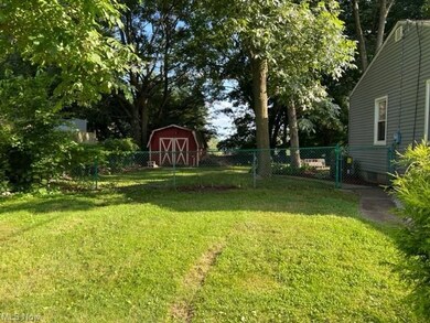 Side yard looking to back to the Shed