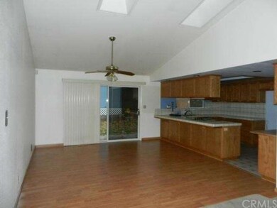 View front entry to dining & kitchen