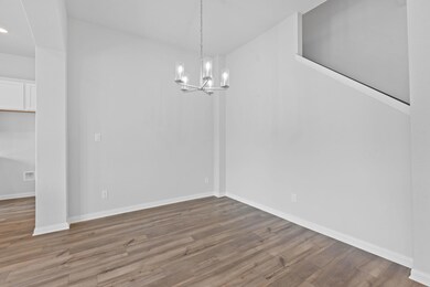 Unfurnished dining area featuring an inviting cha