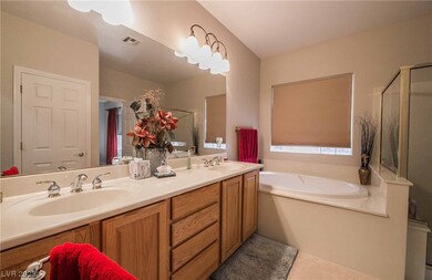 Primary spa bath features double sinks plus separa