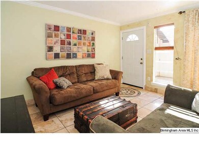 Living room, looking toward entrance