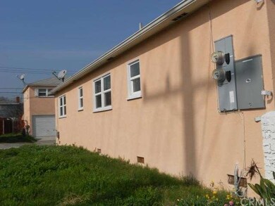 Property south side view.  Backs up to residential