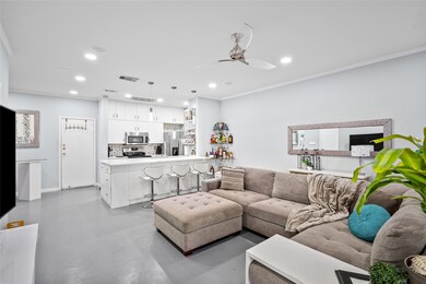 This beautifully designed open-concept space seaml