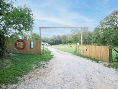 Pretty wood entrance with privacy fence