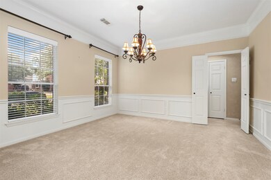 The large formal dining room has large molding and a detailed chair rail.   This room is large enough for all your furnishings.
