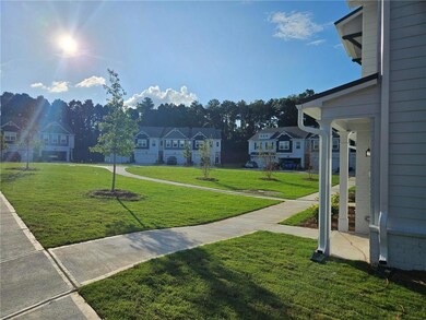 View of home's community with a residential view and a yard