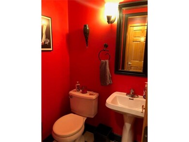 Guest Bath with Ceramic Tile Floor. Located of hal
