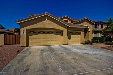 Large 3 car garage and RV gate