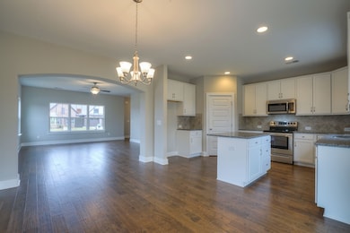 Kitchen/dining area.  Picture of similar home.