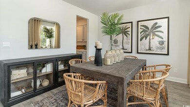 Dining area with hardwood / wood-style flooring