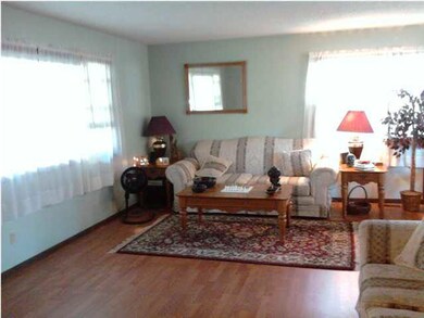 Big living room with new laminate flooring.