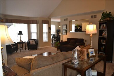 Open Floorplan from Vaulted Family Room into Kitch