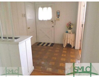 Foyer. Large foyer with parquet flooring and built