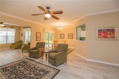 Great room, sun room, and dining area.
