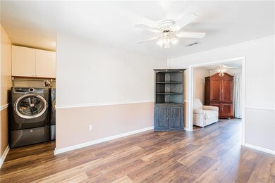 Breakfast nook looking in to the laundry room and living room
