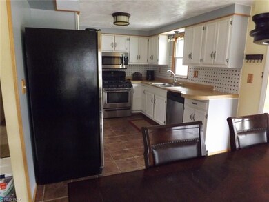 View of the kitchen from the eat-in area of the ki