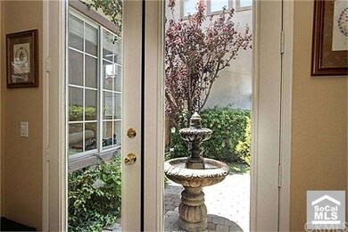 Charming courtyard with fountain as a focal point