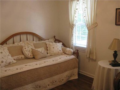 Bedroom. One of the 4 upstairs bedrooms, potential