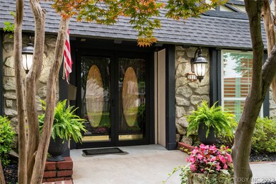 Double Front door with storm doors.