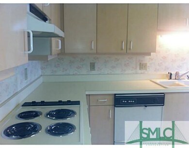 Kitchen. Electric cook top and hood, dishwasher an