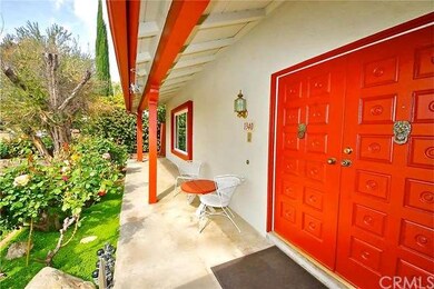 Covered porch and double door entryway