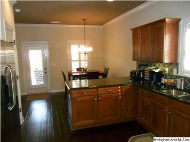 Kitchen view 1, showing breakfast room and easy ac
