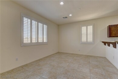 Empty room with recessed lighting, light tile patt