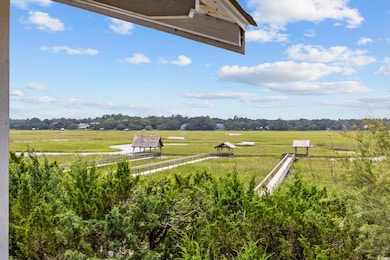 View of yard with a rural view