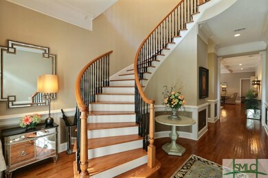 Grand staircase leads to second floor