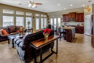 Open family area, kitchen and breakfast nook are great for cooking while gathering with family and friends.