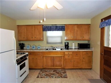 Gas stove, refrigerator, and microwave are all inc