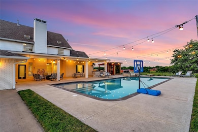 Huge diving pool with attached hot tub and diving board