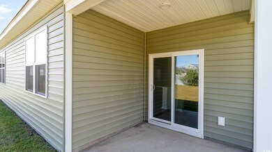Exterior space with a patio