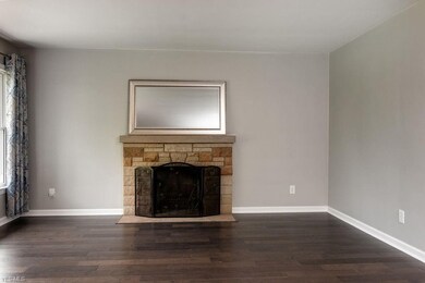 Natural stone mantle balances the modern look of t