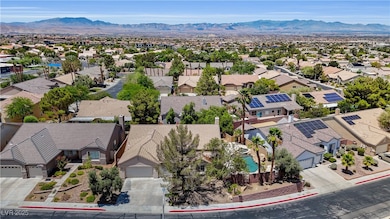 Aerial view of residential area with a mountain ba