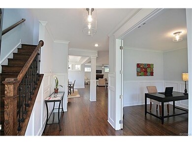 Great open foyer with study and coat closet.  Natural light with windows just about everywhere you look.