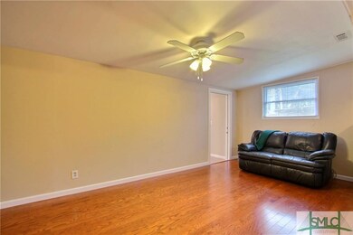 Den w/ new hardwood floors