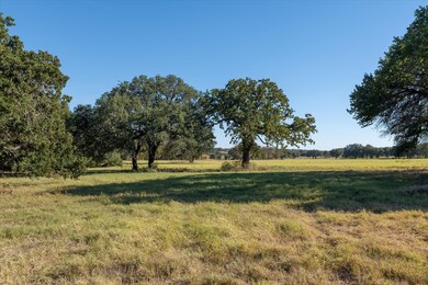 Beautiful rolling pasture with scattered mature hardwoods.