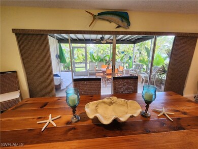 Dining room with a textured ceiling and a ceiling