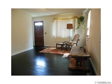 Living Room. Refinished hardwoods throughout first