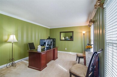 Living room currently used as home office.