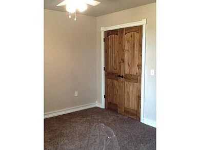Bedroom. Beautiful solid wood Carriage Doors have 