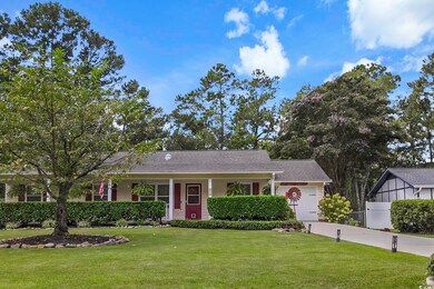 View of front of home featuring a front lawn
