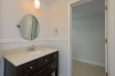 This half bath is located off the kitchen. 
