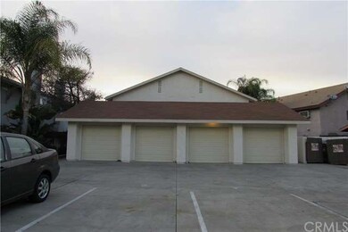 Looking west at the garage building, marked parkin