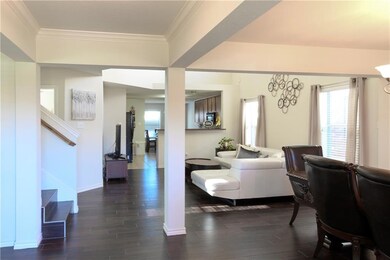 Spacious open floor plan with beautiful dark ceram