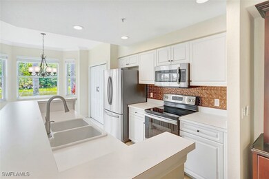 Kitchen featuring appliances with stainless steel