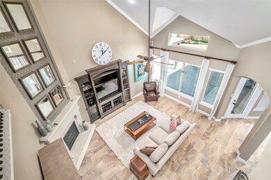 Enjoy this lovely view of the family room from the second floor catwalk.