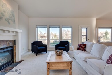 Living room overlooks linear park and path - gas f