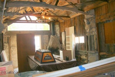 ..looking back to big window & stone, wood burning